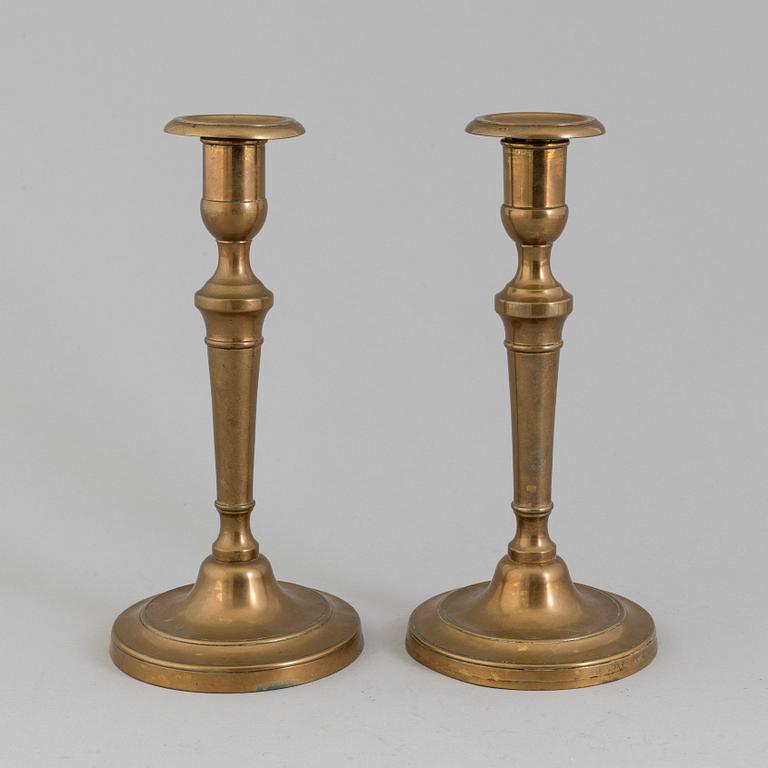 A PAIR OF BRONZE CANDLESSTICKS, 19th century.