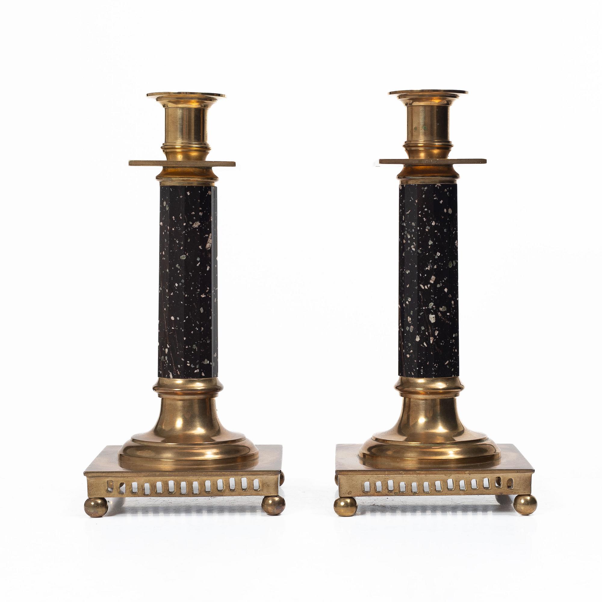 A pair of candlesticks brass and porphyry, EOS Jönköping, 20th century.