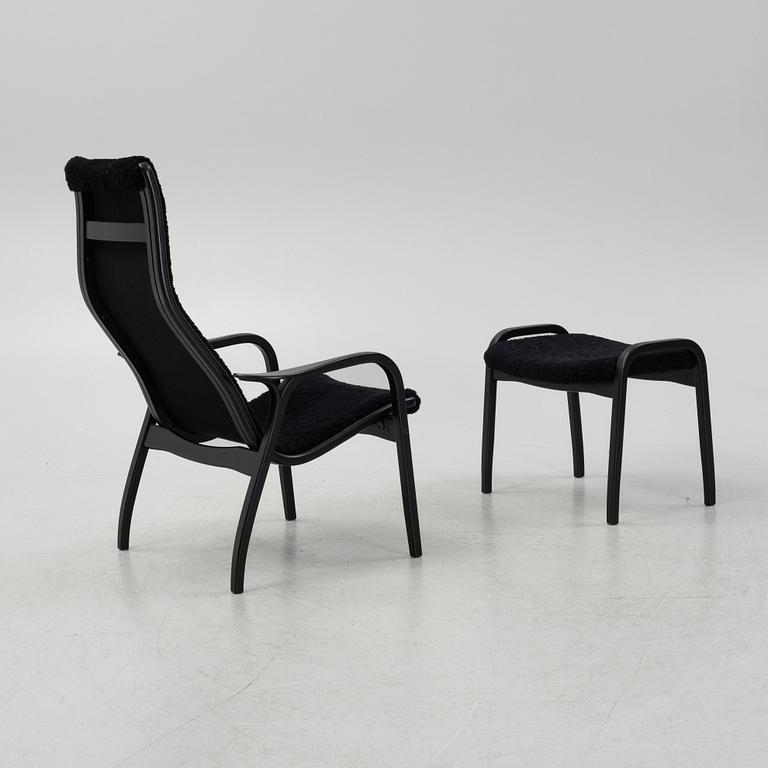 Yngve Ekström, a 'Lamino' armchair with stool, Swedese, Sweden, 2019.