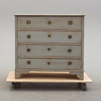 A mid 19th century painted chest of drawers.