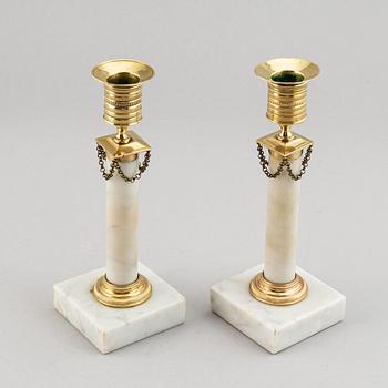 A pair of late-gustavian candlesticks, around year 1800.
