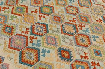 A carpet, kilim, ca 357 x 256 cm.