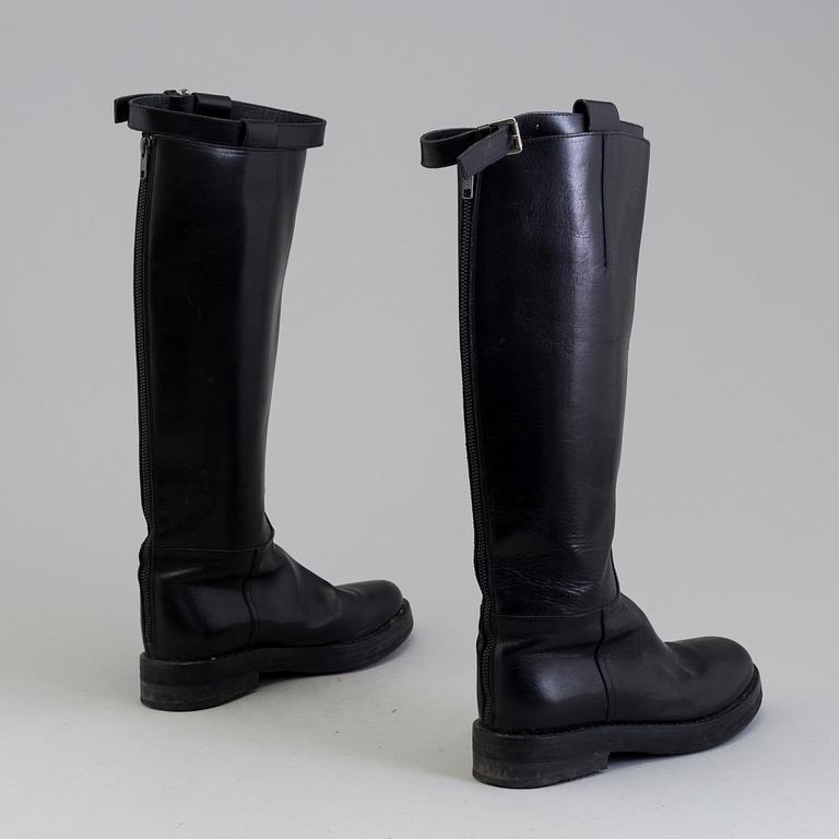 a pair of Ann Demeulemeester, "Vitello Lucido Nero Riding Boots". Size 38.
