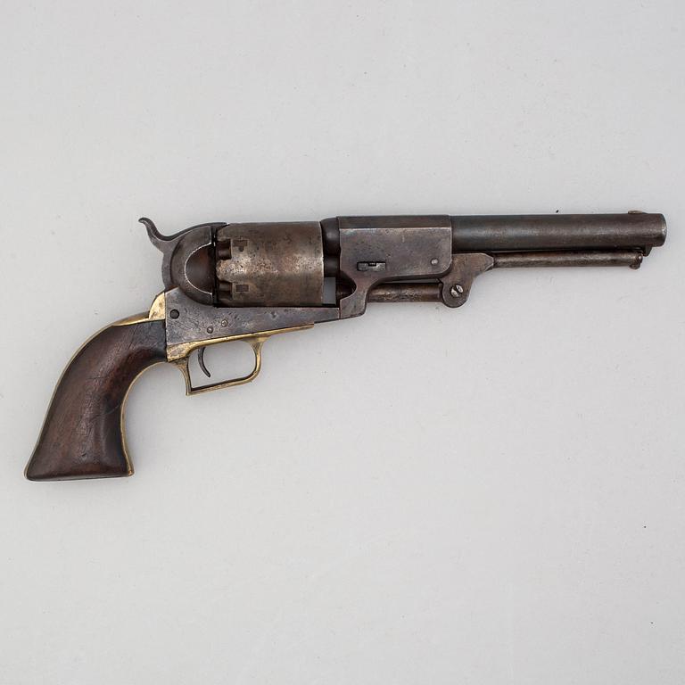 A Colt Dragoon percussion revolver no 9344 manufactured 1850.