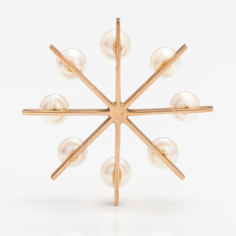 EERO RISLAKKI, A 14K gold pendant with cultured pearls. Westerback, Helsinki 1964.