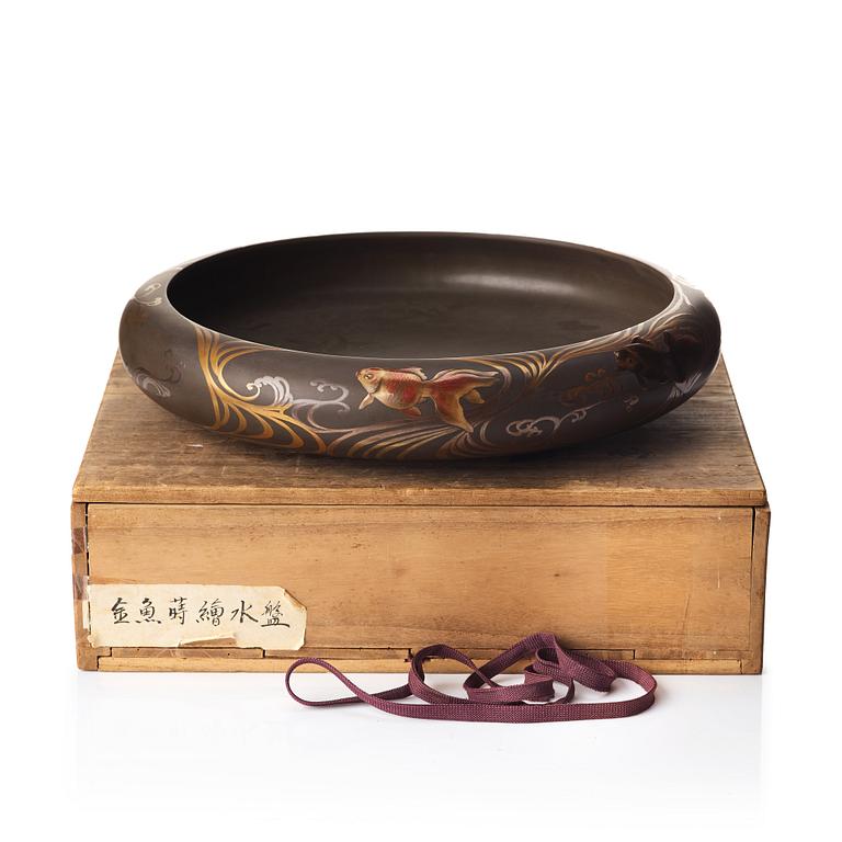 A lacquered bowl, Japan, Zohiko Company.