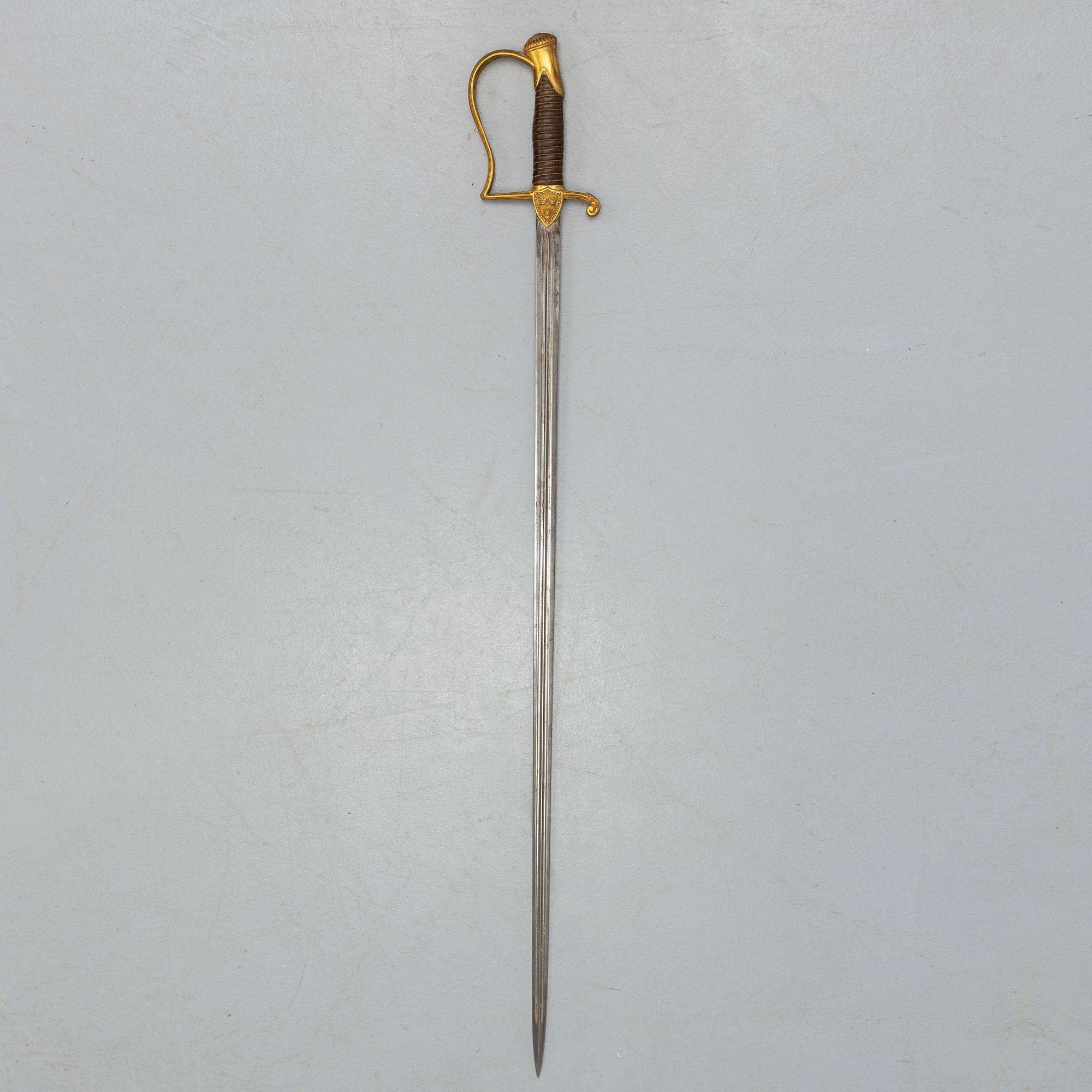 A Swedish late 19th century small sward, and a belt by Sporrong, 20th century.