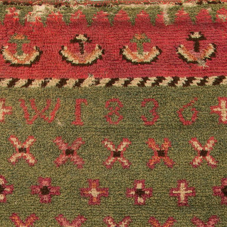 A Finnish folkart long pile ryijy.rug dated 1836. Circa 180 x 140 cm.