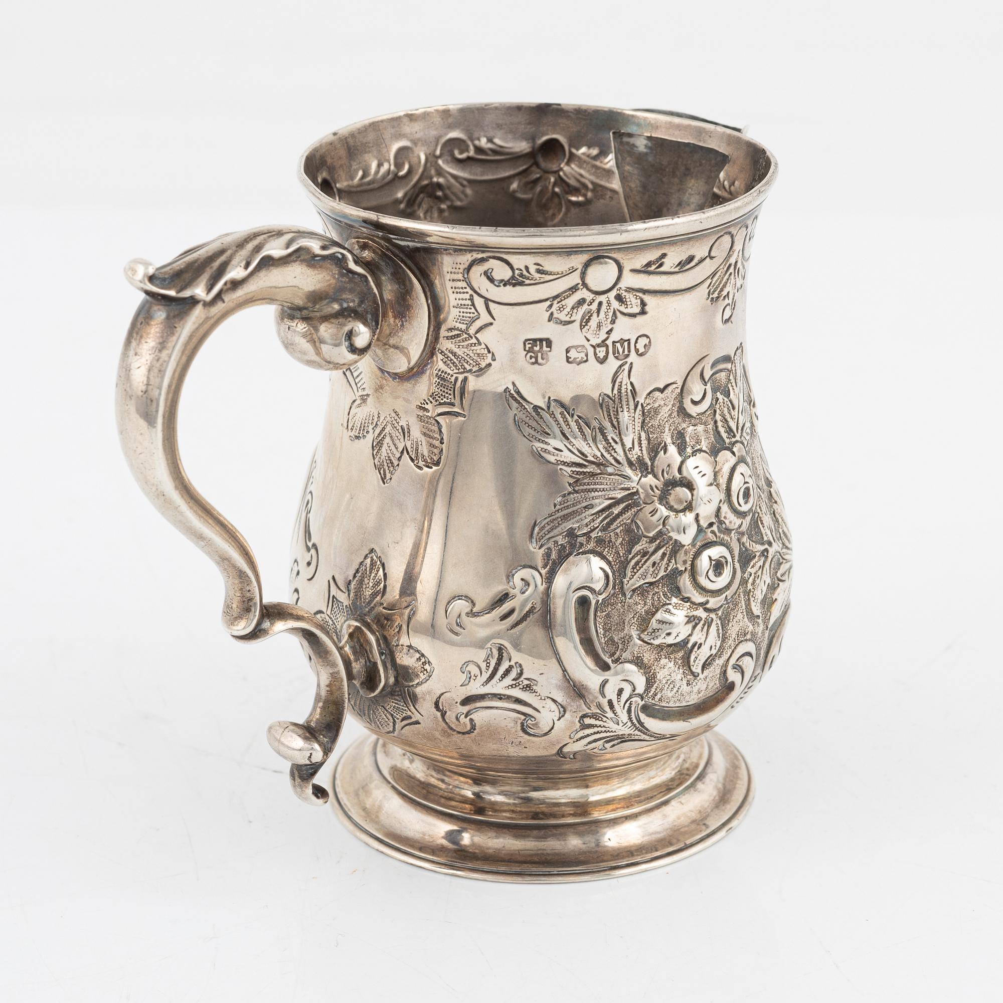 An English silver creamer, London, 1887.
