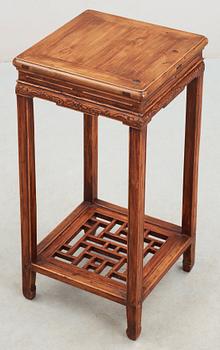 A blond hardwood table, late Qing dynasty (1644-1912).