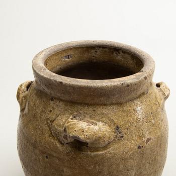 Two olive green glazed South East Asian jars, 14th/17th Century.