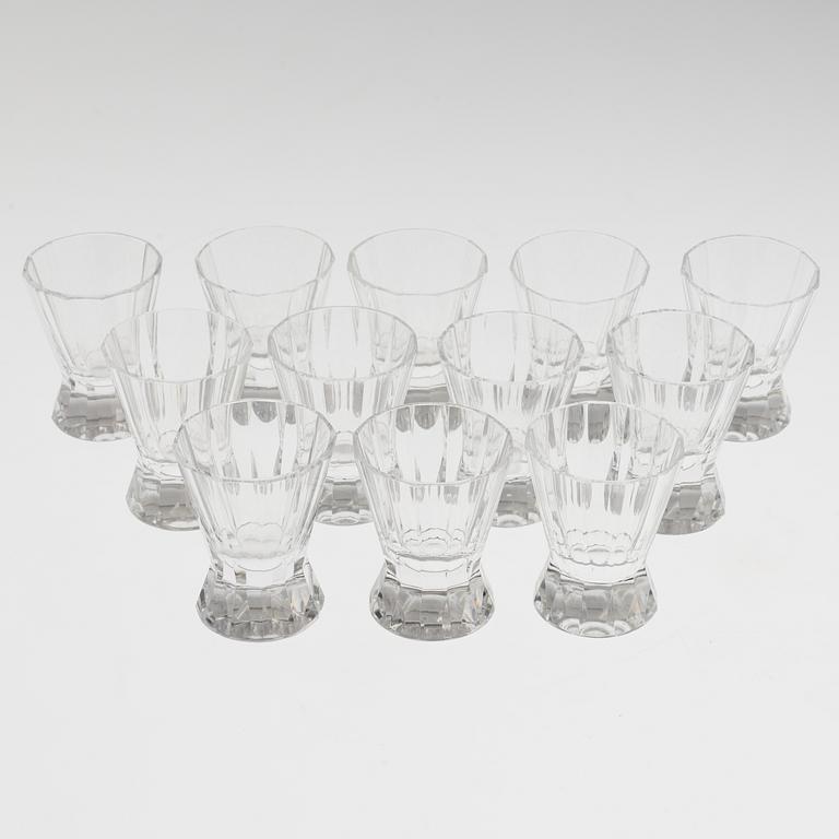 A set of twelve glasses and a cocktailshaker by Elis Berg, Kosta.