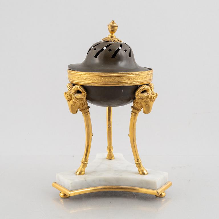 A French Empire ormolu and patinated bronze brûle-parfum, early 19th century.
