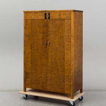 A birch venereed cabinet, 1930's.