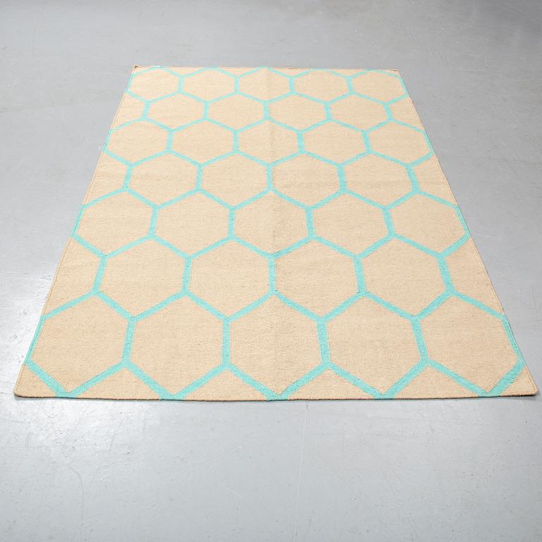 A CARPET, flat weave, ca 244 x 151 cm.