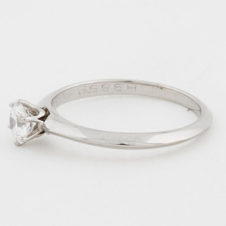 A brilliant cut diamond ring by Tiffany & Co.