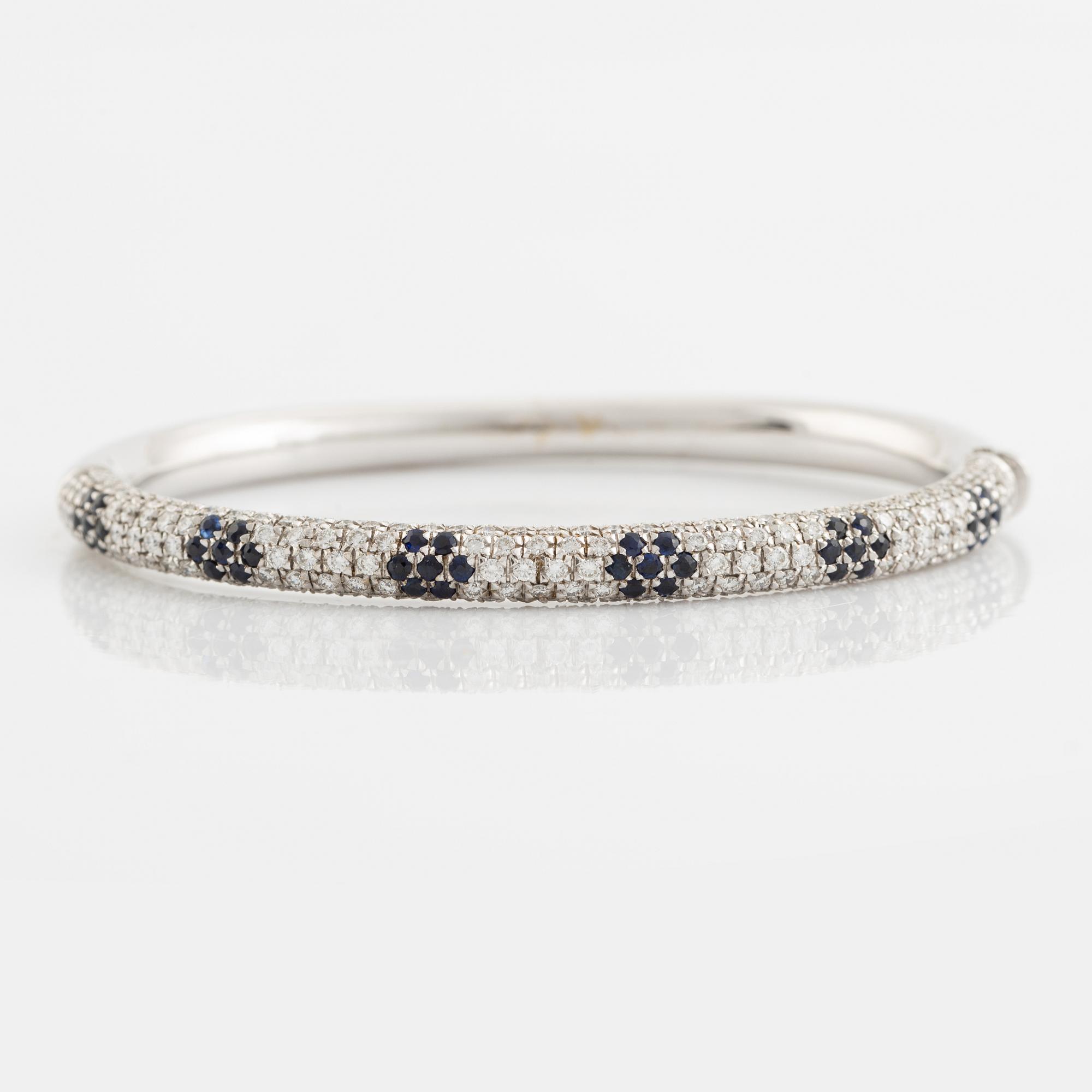 Sapphire and brilliant cut diamond bangle.