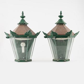 Wall lamps, outdoor lighting, a pair, cast iron, second half of the 20th century.
