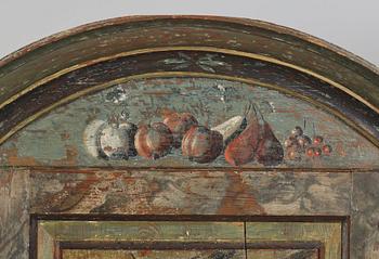 A Swedish polychrome-painted corner cabinet attributed to J. Bäckström (1773-1837).