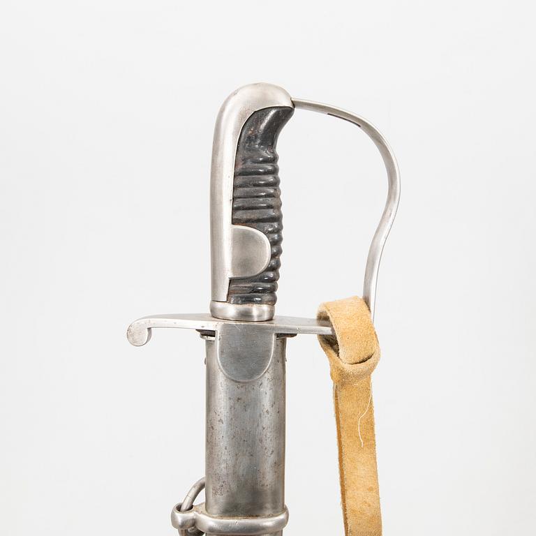 A Swedish artillery sword , 1831 pattern. with scabbard.