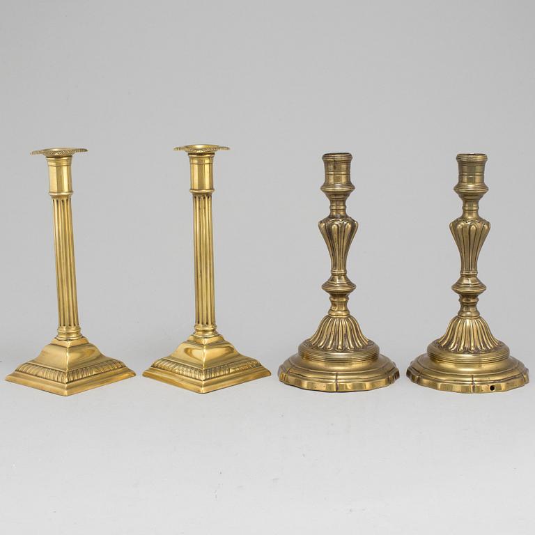 CANDLESTICKS, two pairs, brass, 18th and 19th century.
