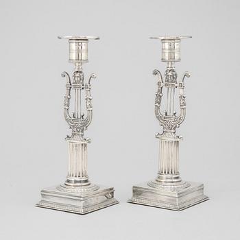 A pair of silver candle sticks by Adolf Zethelius, Stockholm 1821.