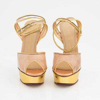 Charlotte Olympia, a pair of gold tone platform shoes, italian size 37.