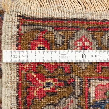 A Tabriz carpet, c. 390 x 305 cm.