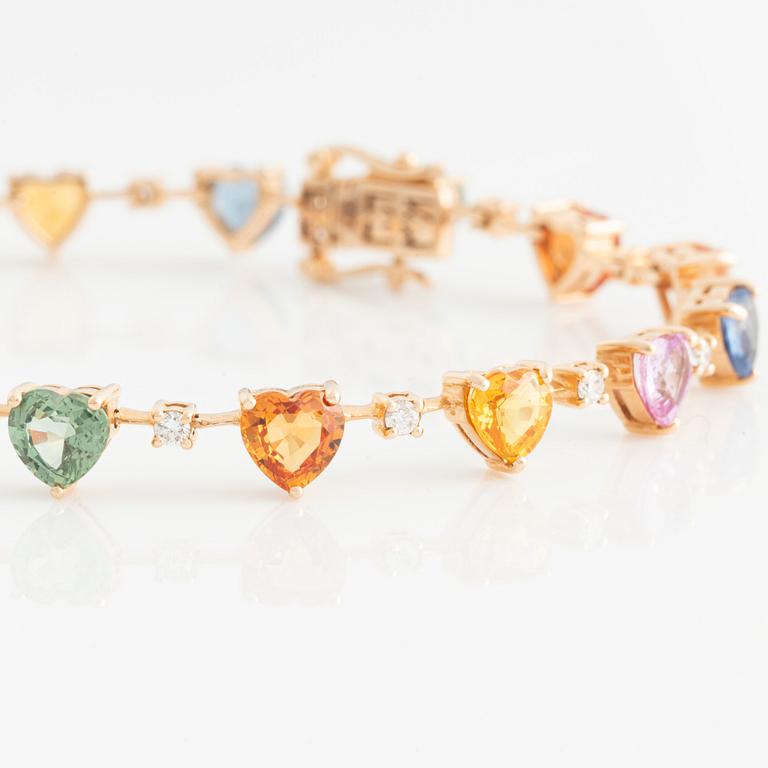 Bracelet with heart-shaped multicolored sapphires and brilliant-cut diamonds.