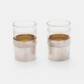 A set of six shot glasses with a tray in original fitted box, silver and glass, likely Norway 1910s.