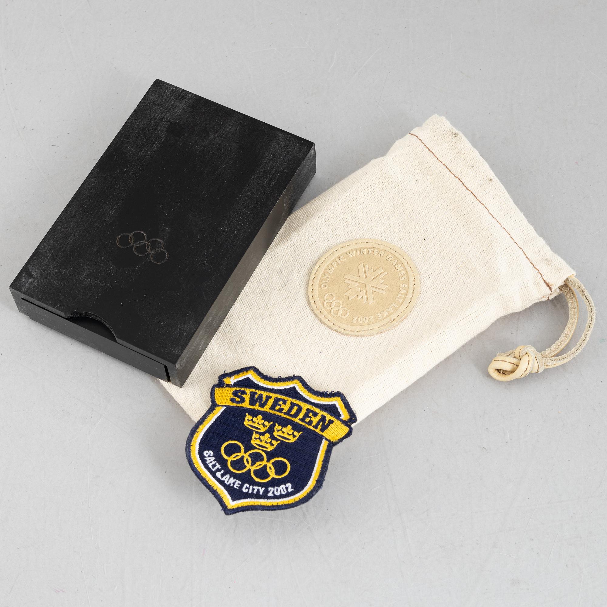 Participation medal, Olympics, Salt Lake City 2002 and a patch for the Swedish Team.