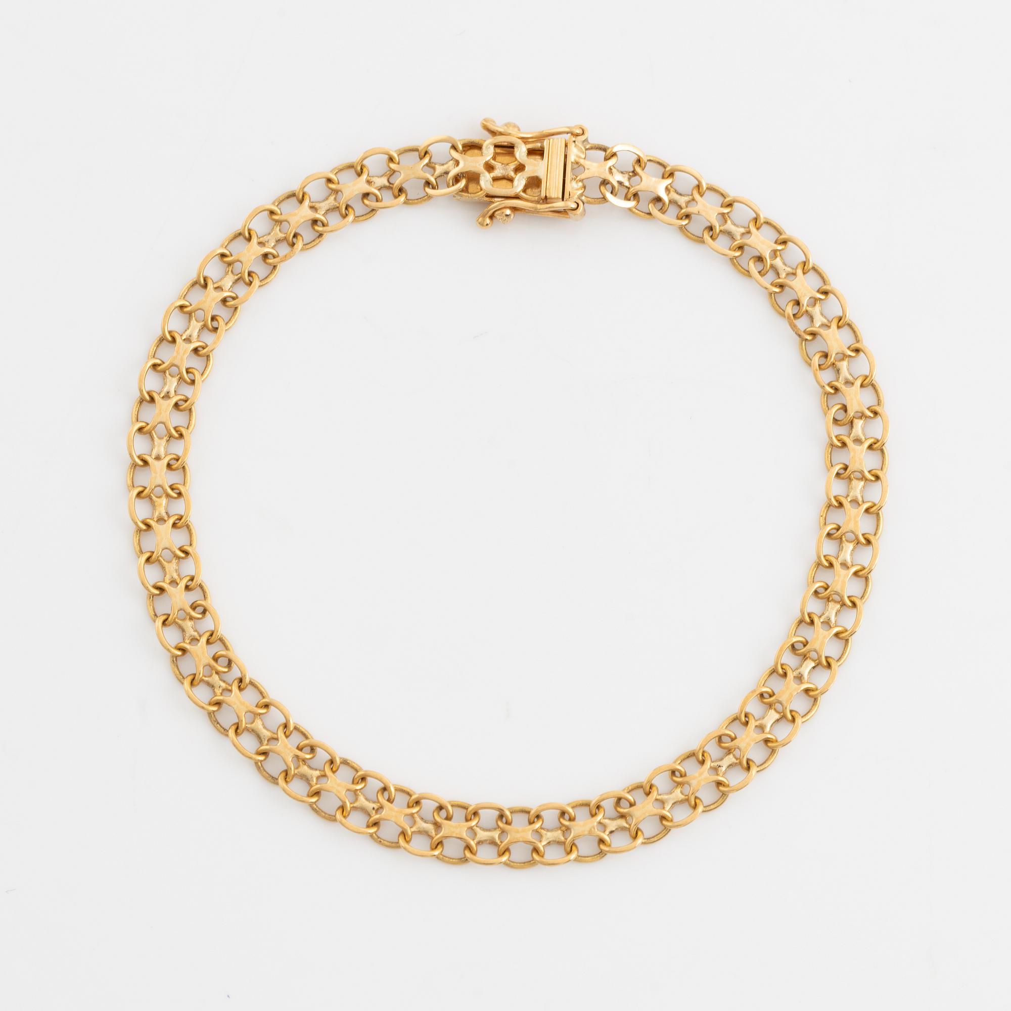 Armlänk, 18K guld, x-länk.