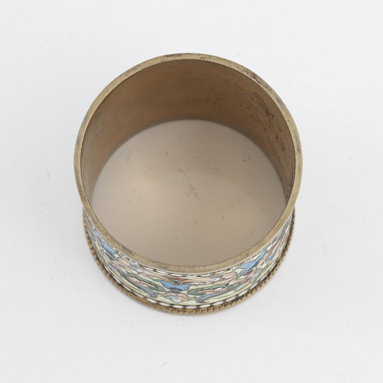 A Russian silver-gilt and cloisonné enamel napkin ring, unidentified makers mark, Moscow 1899-1908.