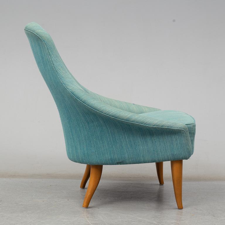 KERSTIN HÖRLIN-HOLMQVIST, a 'Lilla Eva' easy chair, for Nordiska Kompaniet, mid 20th century.