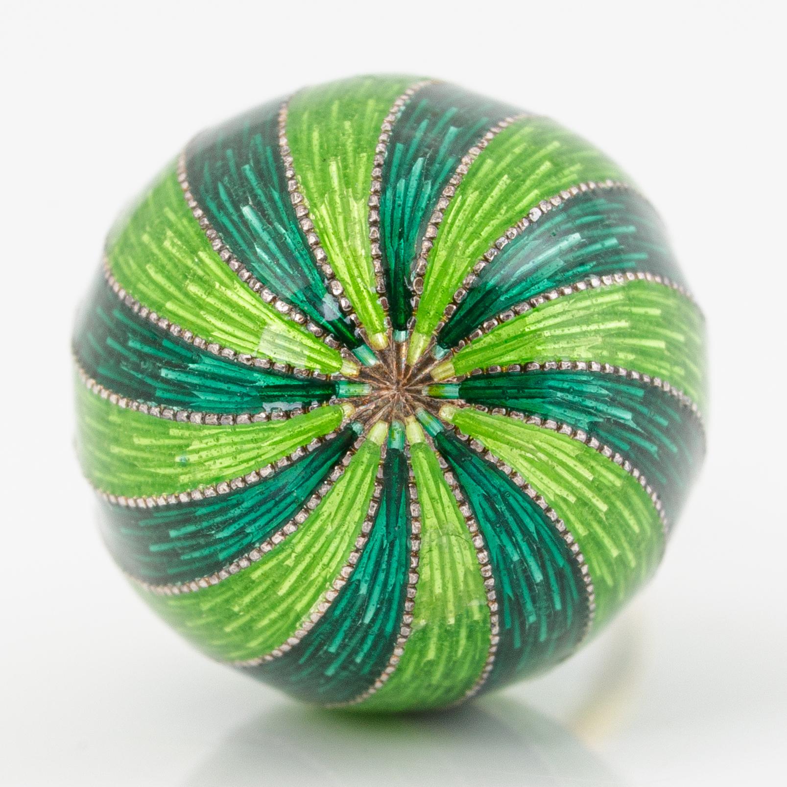 W.A. Bolin, pendant in the form of an egg, 18K gold and silver and enamel.