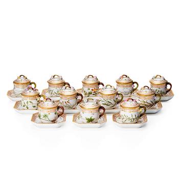 464. A set of 12 Royal Copenhagen 'Flora Danica' custard cups with covers and stand, Denmark, 20th Century.