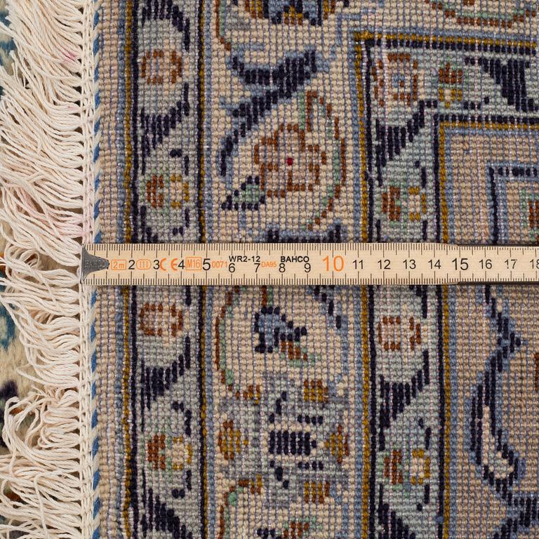 A Persian semi-antique carpet, Kashan, circa 380 x 288 cm.