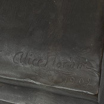 Alice Nordin, seated female figure.