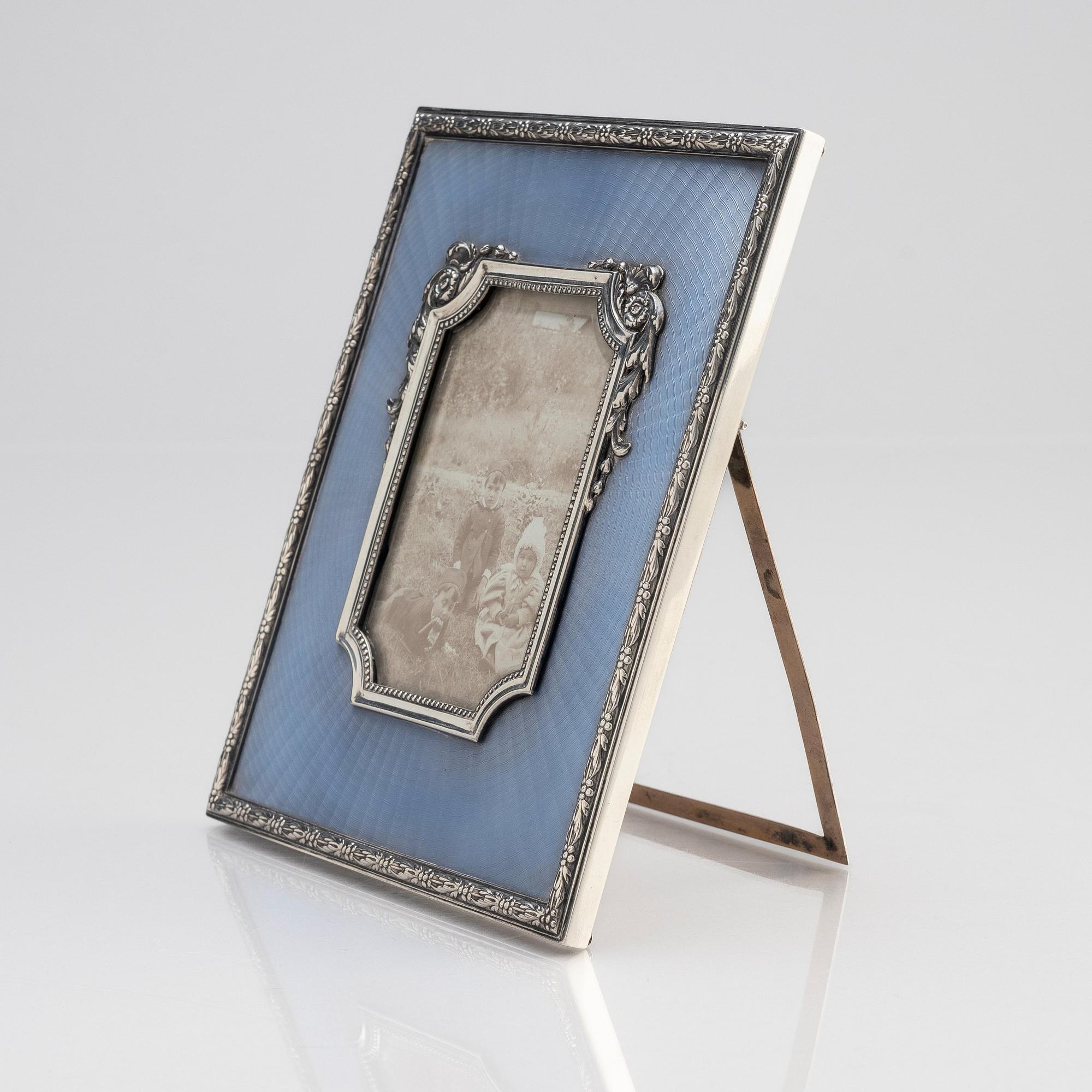 A Wilhelm Bolin silver and guilloché enamel frame, Moscow 1912-1917.