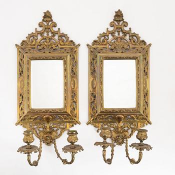 A pair of metal mirror sconces, first half of the 20th century.
