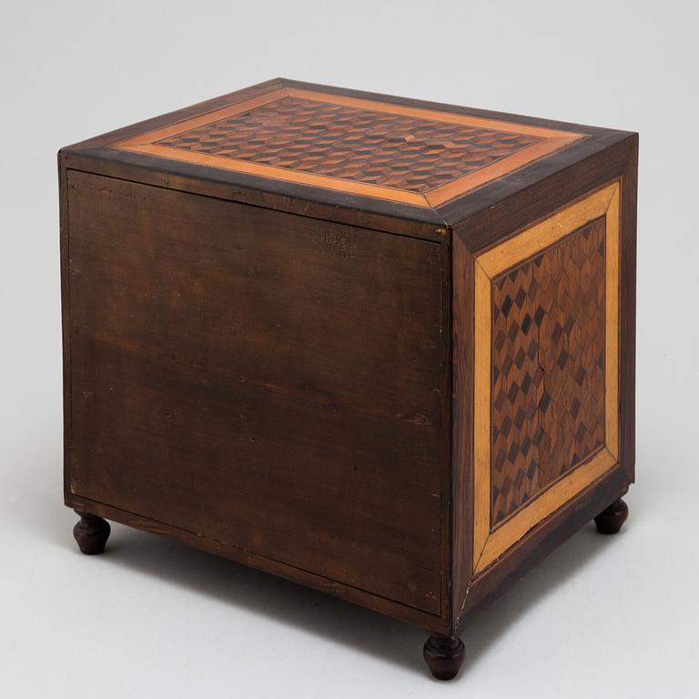 A 19th century chest of drawers.