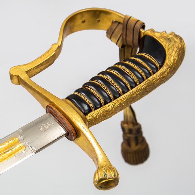 A Swedish infantry officers sword 1899 pattern with scabbard.