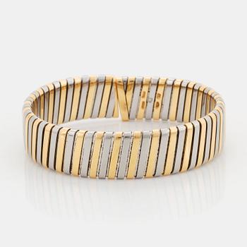 A Bulgari "Tubogas" bracelet in 18K gold and steel.