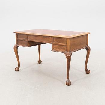 A mid 1900s Chippendale style mahogany desk.