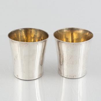 A set of four silver beakers, including Anders Rothman the Younger, Örebro, 1852-54.