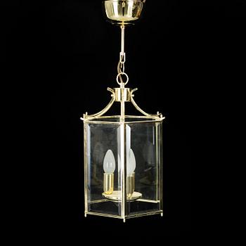 A 20th century brass hexagon hall ceiling lantern for three lights.