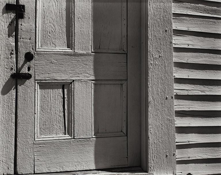 Edward Weston, "Church Door, Hornitus, California, 1940".