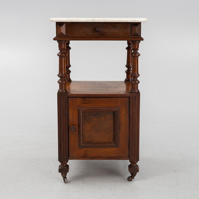An early 20th century bedside table.