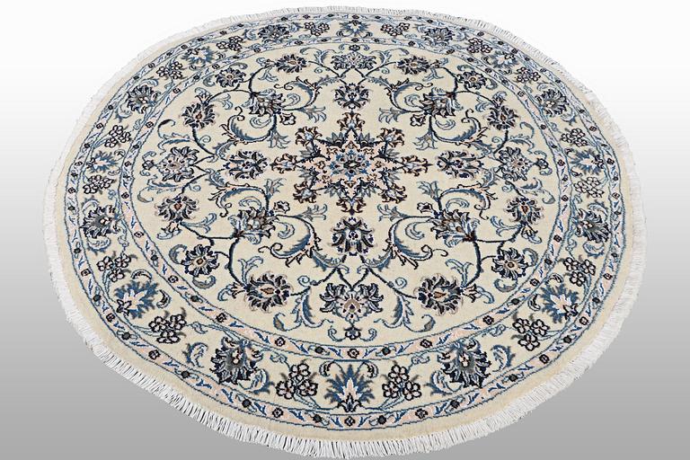 A rug, Nain, part silk, ca 146 x 146 cm.