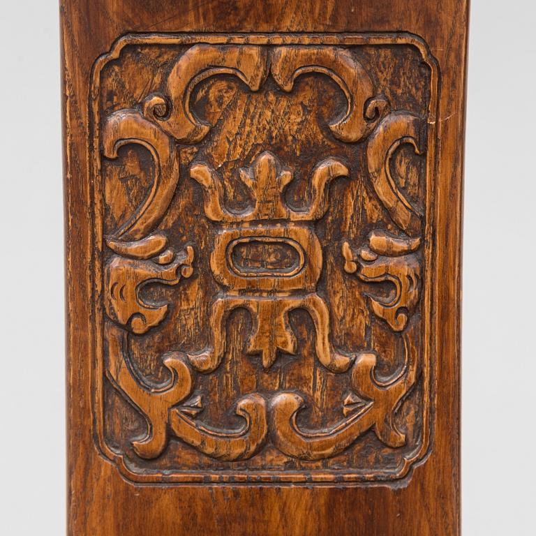 A Chinese wooden armchair, 20th century.